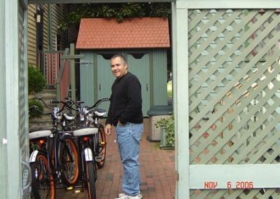 Guest Photos- Man next to Queen Victoria bikes.